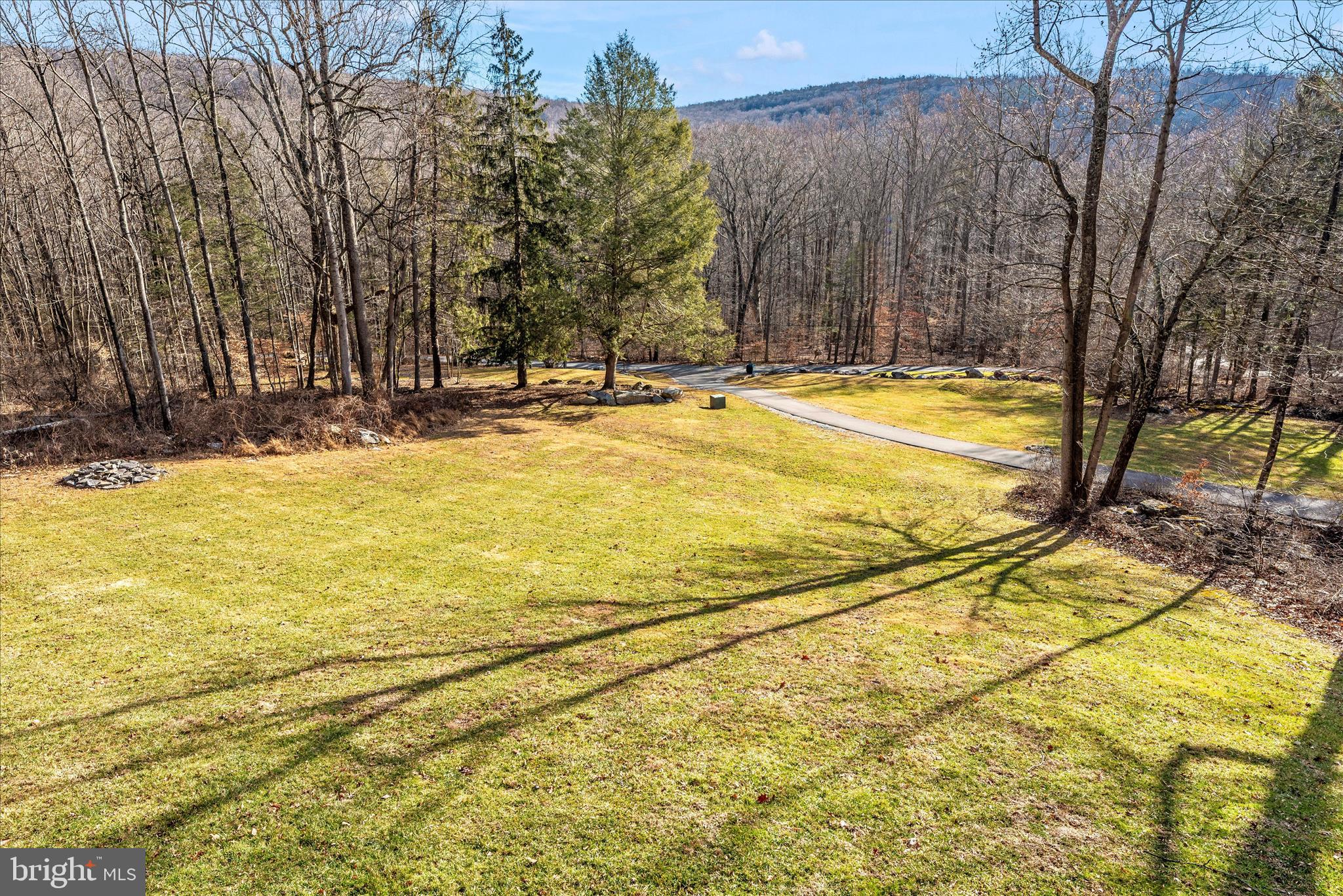 12804 Spruce Run Road Myersville, MD 21773 - Photo 50 of 72 a view of a swimming pool with an outdoor space and seating area