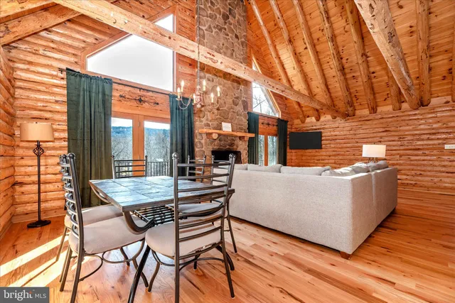 a kitchen with stainless steel appliances granite countertop a sink and a wooden cabinets