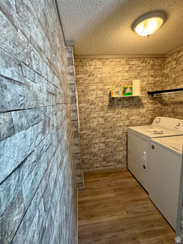972 Ridgeway Loop, Unit 228 Garden City, UT 84028 - Photo 14 of 26 Laundry area with washer and clothes dryer