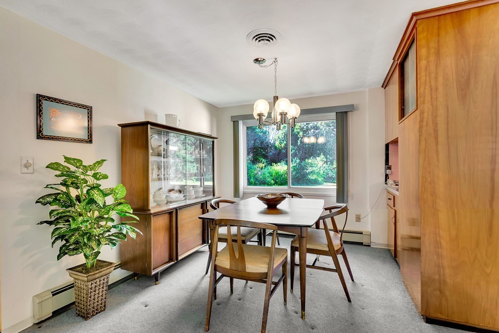 14 Clara Road Framingham, MA 01701 - Photo 4 of 11 a view of a dining room with furniture window and outside view