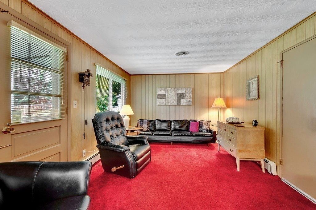 14 Clara Road Framingham, MA 01701 - Photo 6 of 11 a living room with furniture and a window