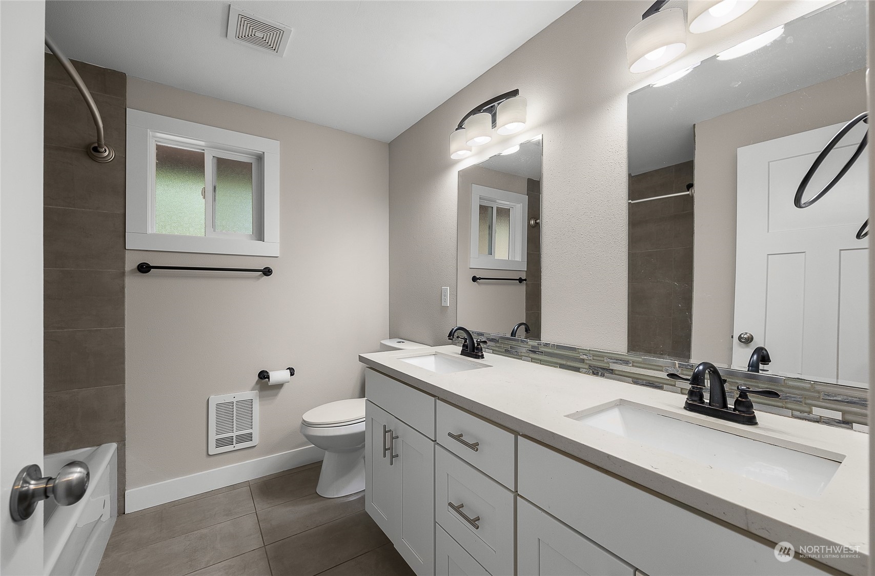 9512 Edmonds Way Edmonds, WA 98020 - Photo 16 of 24 a bathroom with a granite countertop sink mirror and toilet