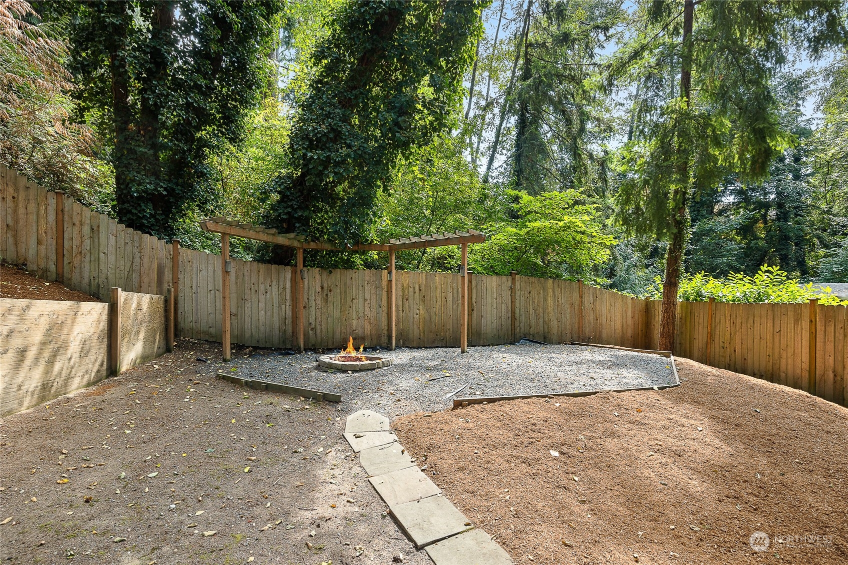 9512 Edmonds Way Edmonds, WA 98020 - Photo 23 of 24 a backyard of a house with table and chairs
