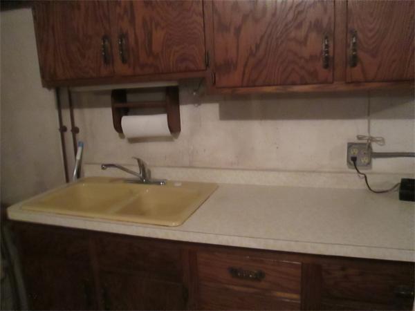 1590 Bay Road Stoughton, MA 02072 - Photo 22 of 22 a bathroom with a sink and cabinets