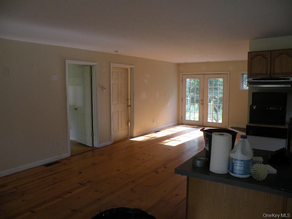 618 Bean River Road Millerton, NY 12546 - Photo 8 of 16 a living room with furniture and a fireplace