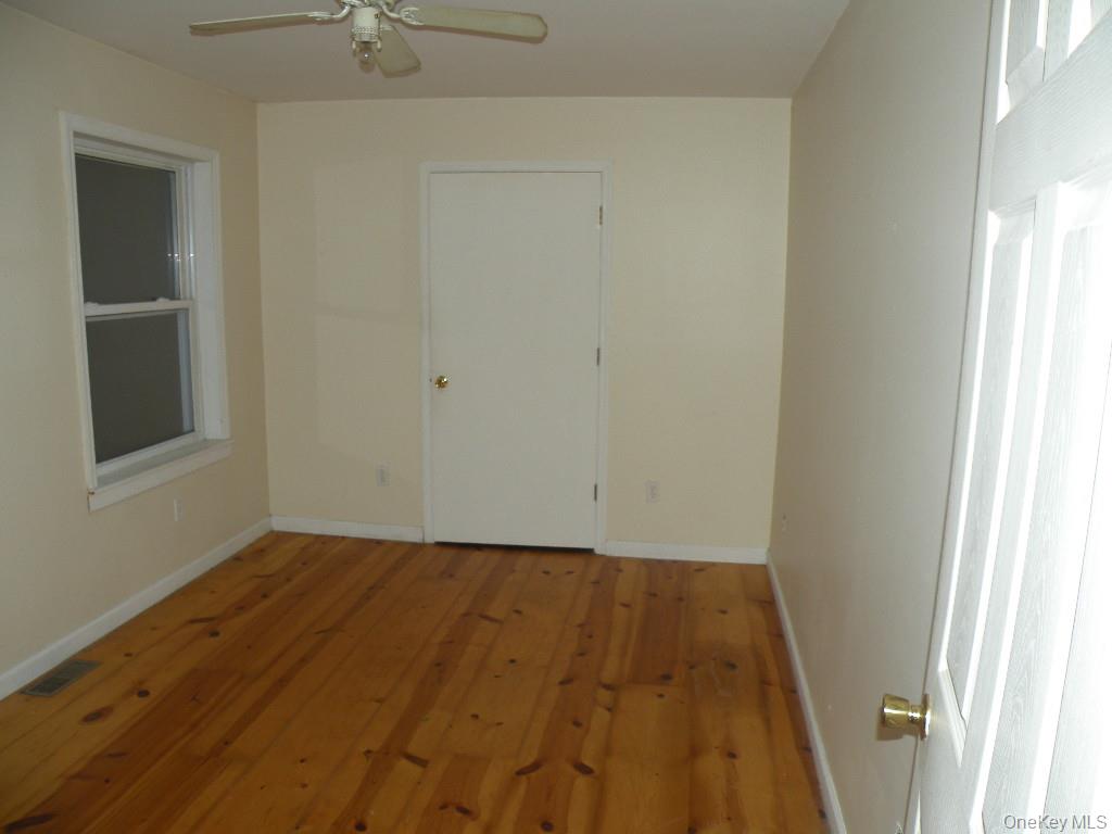 618 Bean River Road Millerton, NY 12546 - Photo 9 of 16 an empty room with a window