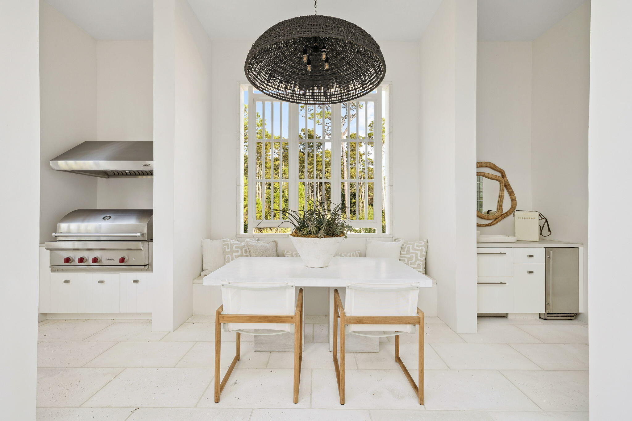 53 Portico Ln Inlet Beach Inlet Beach, FL 32461 - Photo 17 of 47 a kitchen with a table chairs and a stove