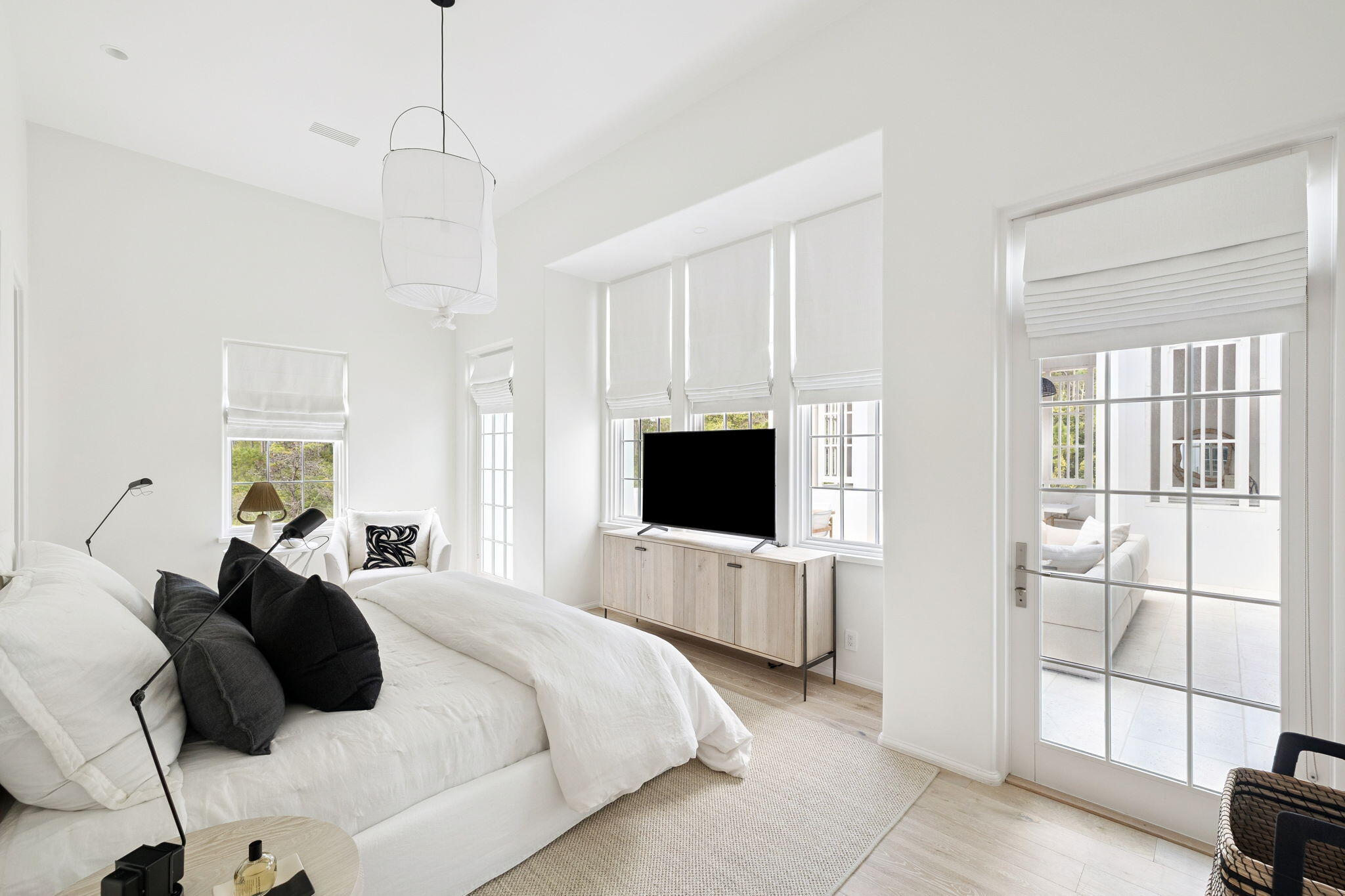 53 Portico Ln Inlet Beach Inlet Beach, FL 32461 - Photo 20 of 47 a bedroom with a bed and a television