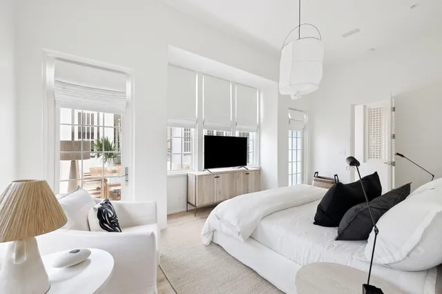 a bathroom with a granite countertop sink mirror and double