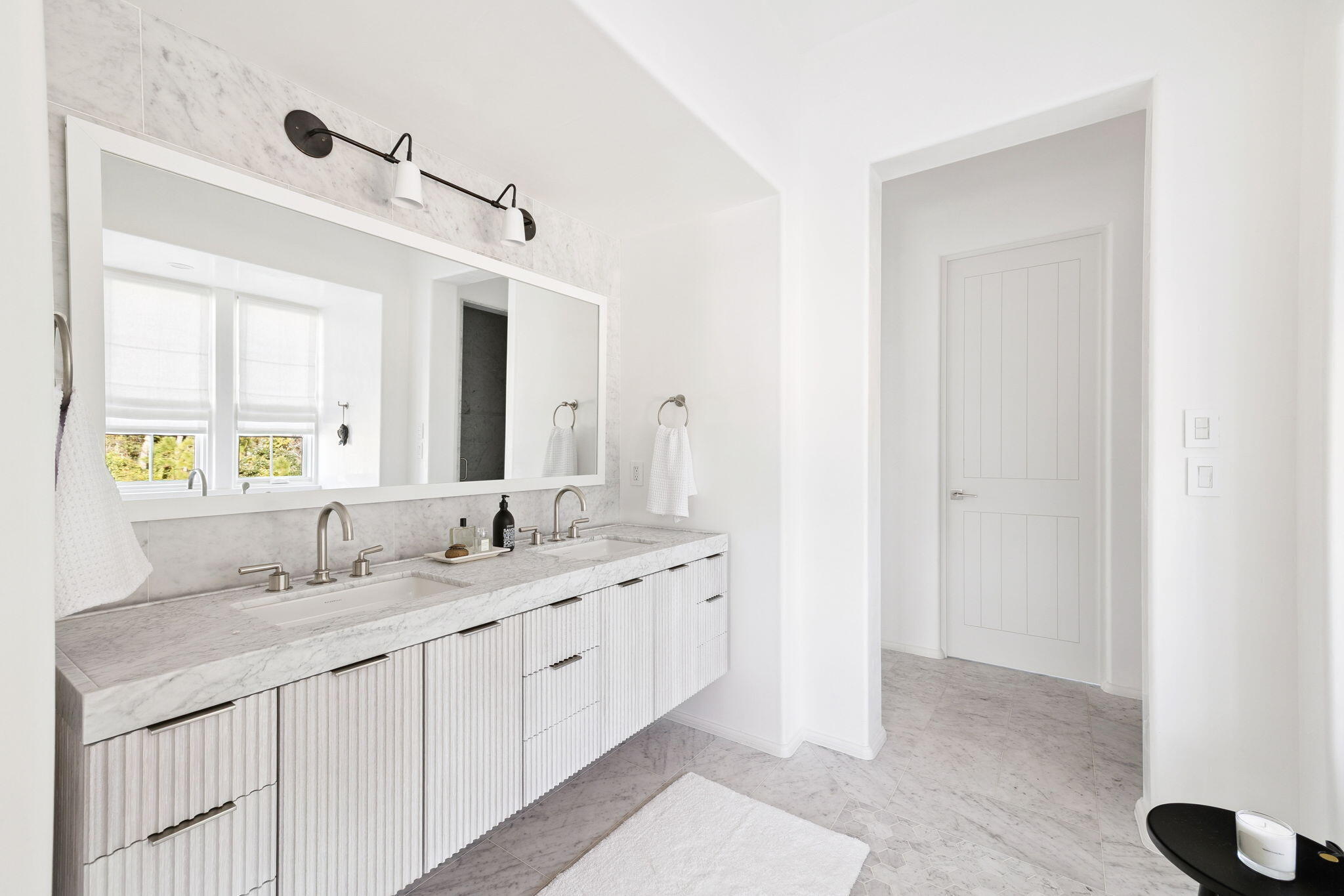 53 Portico Ln Inlet Beach Inlet Beach, FL 32461 - Photo 32 of 47 a bathroom with a double vanity sink and a mirror