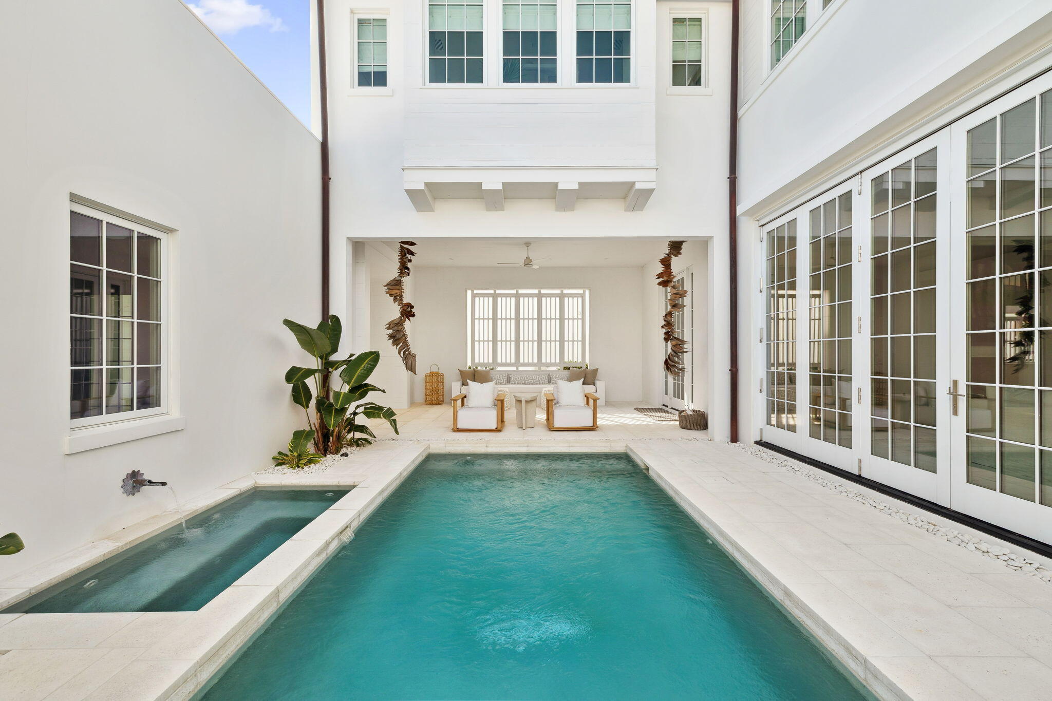53 Portico Ln Inlet Beach Inlet Beach, FL 32461 - Photo 8 of 47 a spacious bedroom with a bed and a large window