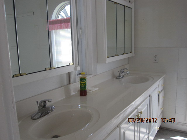 7154 Dry Hill Road Ferrum, VA 24088 - Photo 7 of 12 a bathroom with a sink and a window