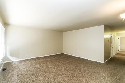 5408 31st Street Lubbock, TX 79407 - Photo 8 of 33 an empty room with an entryway