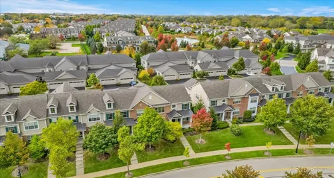 an aerial view of a house with a garden