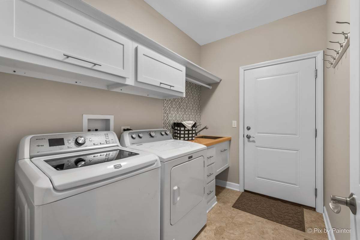2122 Shermer Road Glenview, IL 60026 - Photo 9 of 37 a utility room with dryer and washer