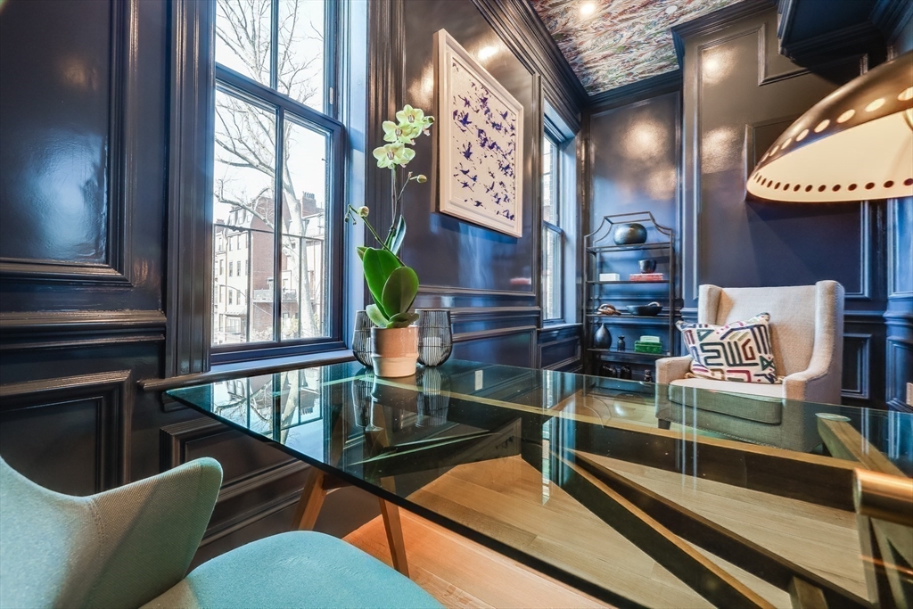 1 Fairfield Street Boston, MA 02116 - Photo 24 of 28 a view of a chairs and table in a balcony