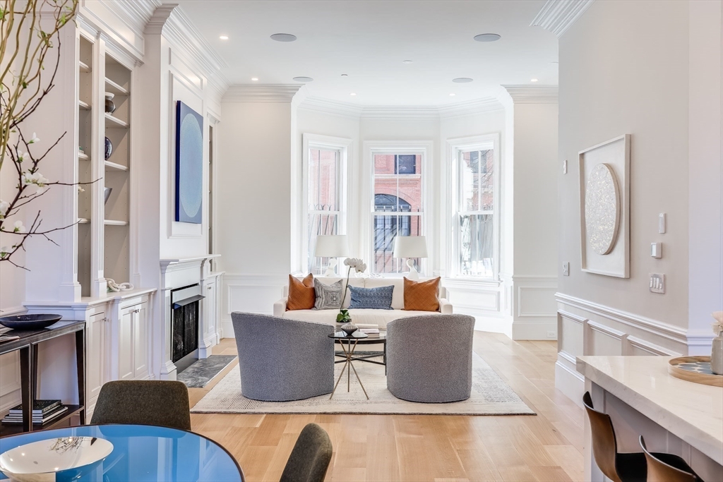 1 Fairfield Street Boston, MA 02116 - Photo 5 of 28 a living room with furniture kitchen view and a window