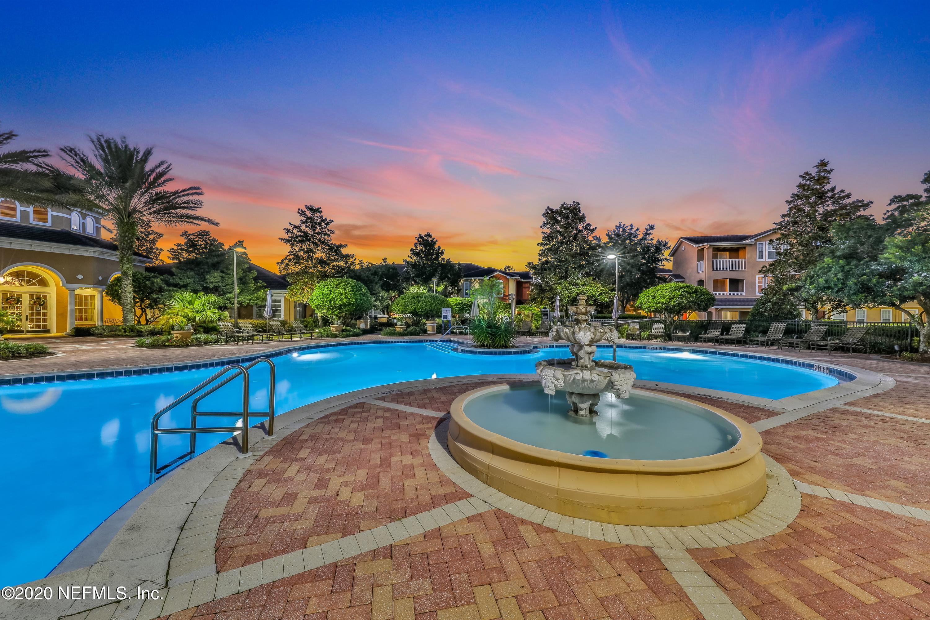 10075 Gate Parkway, Unit 1009 Jacksonville, FL 32246 - Photo 49 of 51 a view of swimming pool with outdoor seating