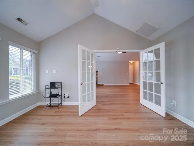 a view of livingroom with hardwood floor and window