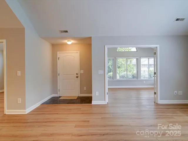 a view of livingroom with hardwood floor and window
