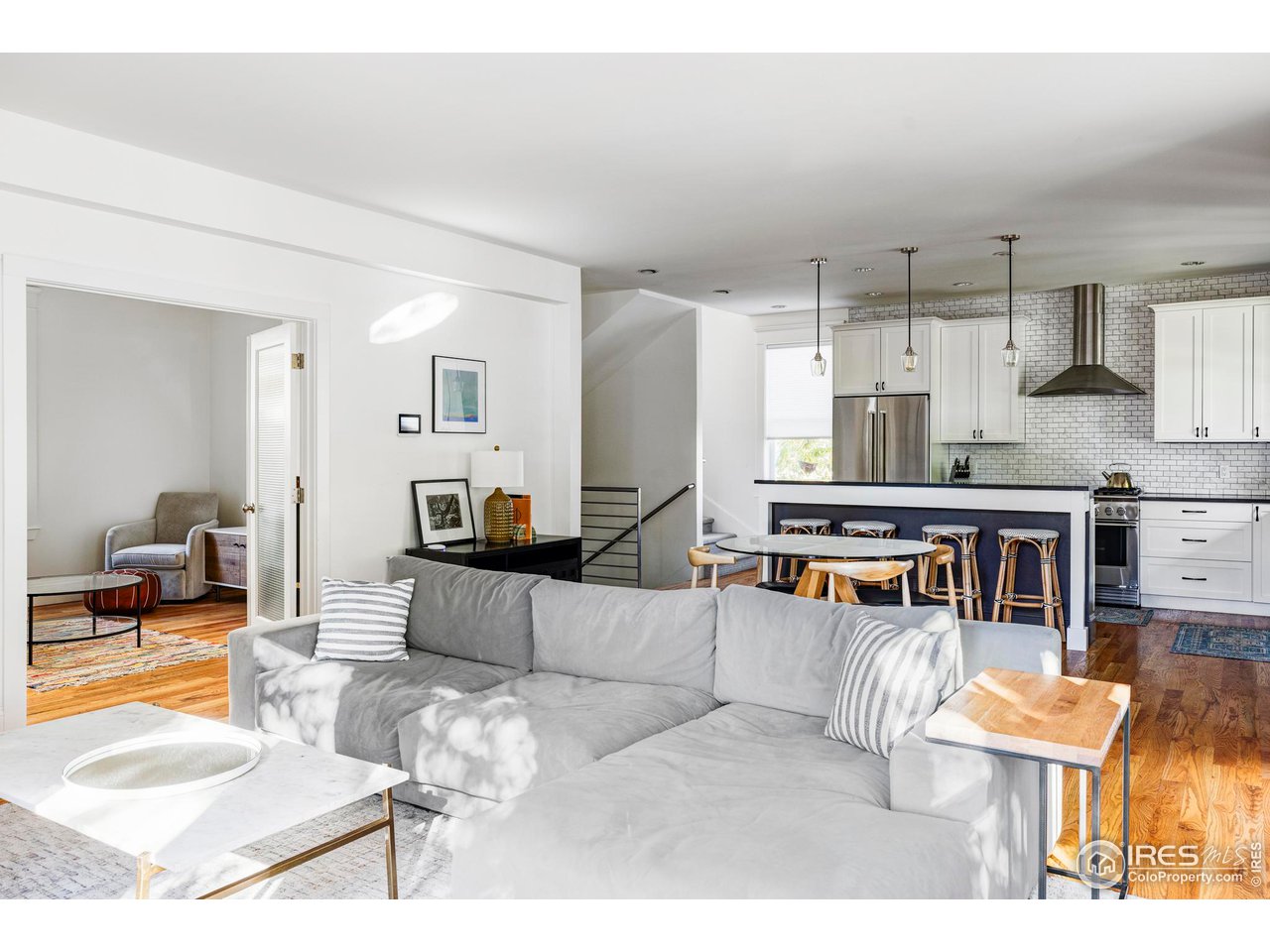 2129 23rd Street Boulder, CO 80302 - Photo 17 of 32 a living room with furniture and a wooden floor