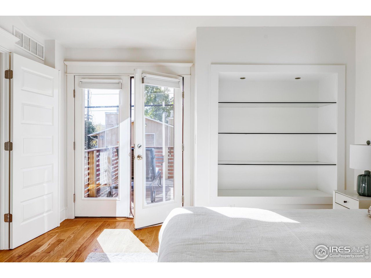 2129 23rd Street Boulder, CO 80302 - Photo 19 of 32 a view of wooden floor and windows in a room