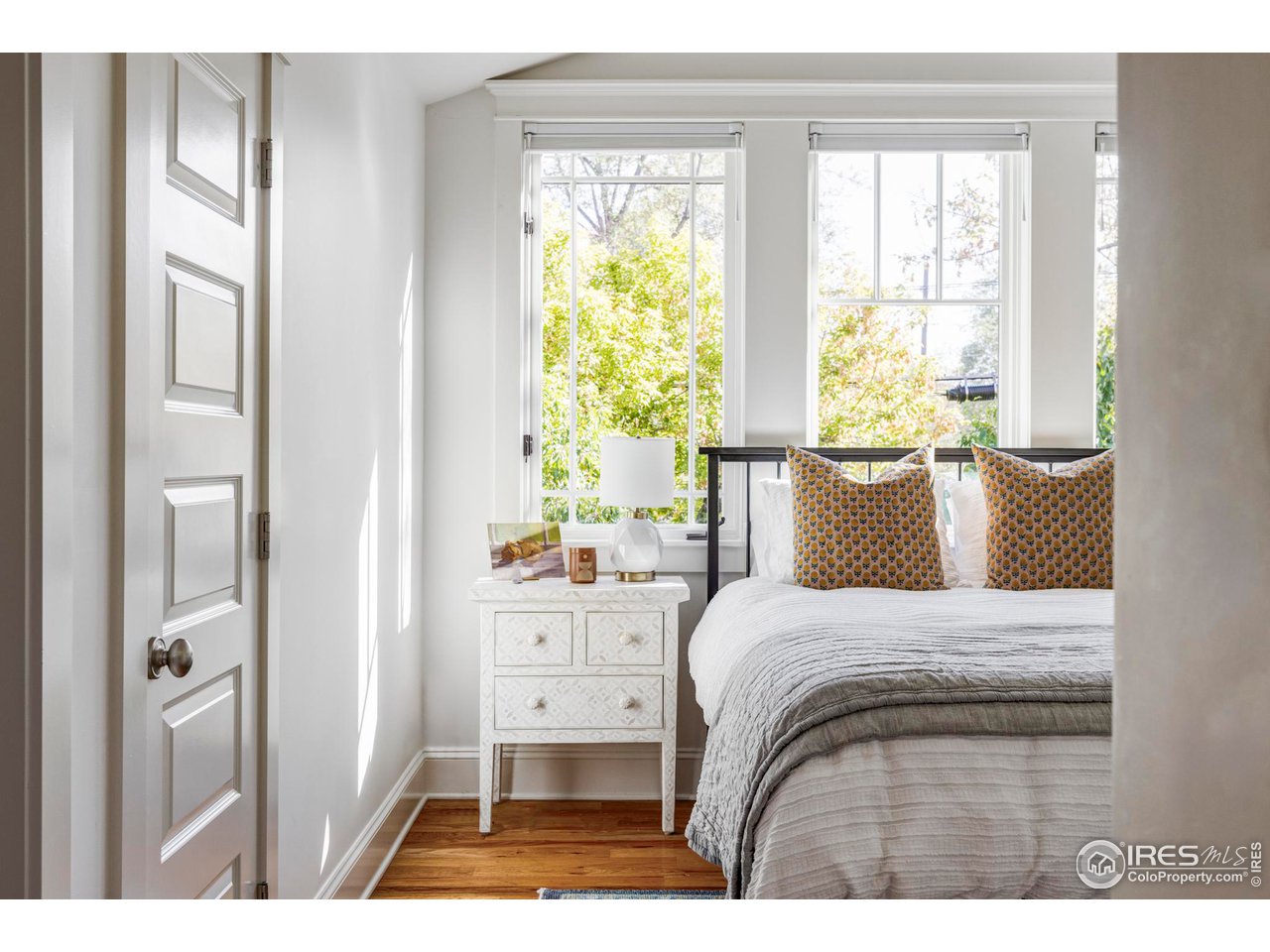 2129 23rd Street Boulder, CO 80302 - Photo 24 of 32 a bedroom with a bed and a window
