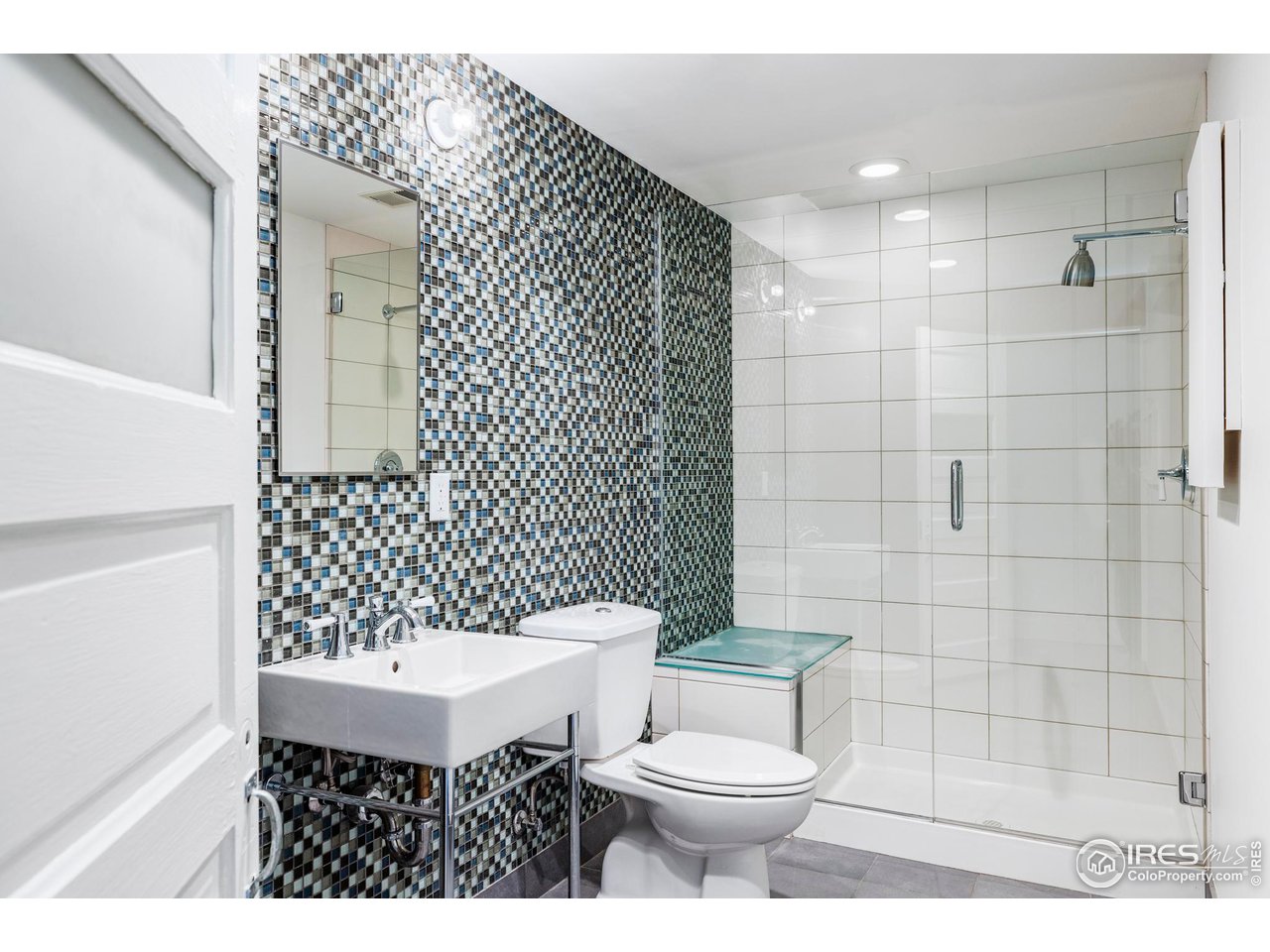 2129 23rd Street Boulder, CO 80302 - Photo 29 of 32 a bathroom with a sink a toilet and shower