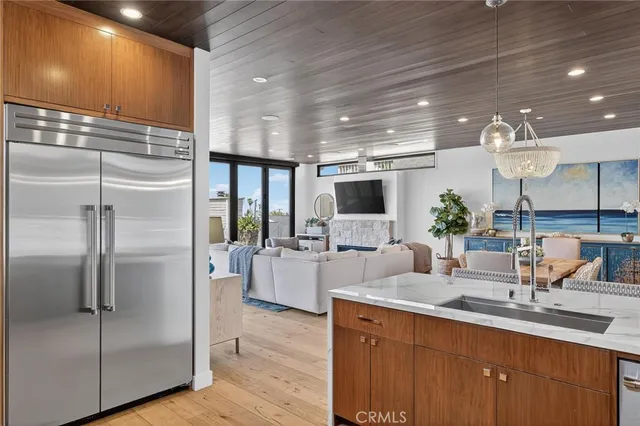 a kitchen with counter top space cabinets and stainless steel appliances
