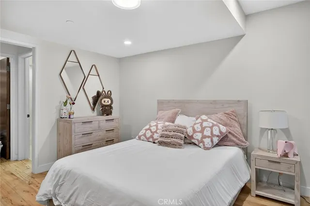 a bedroom with a bed and a closet