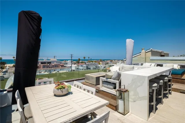 a view of a kitchen with a sink and a stove