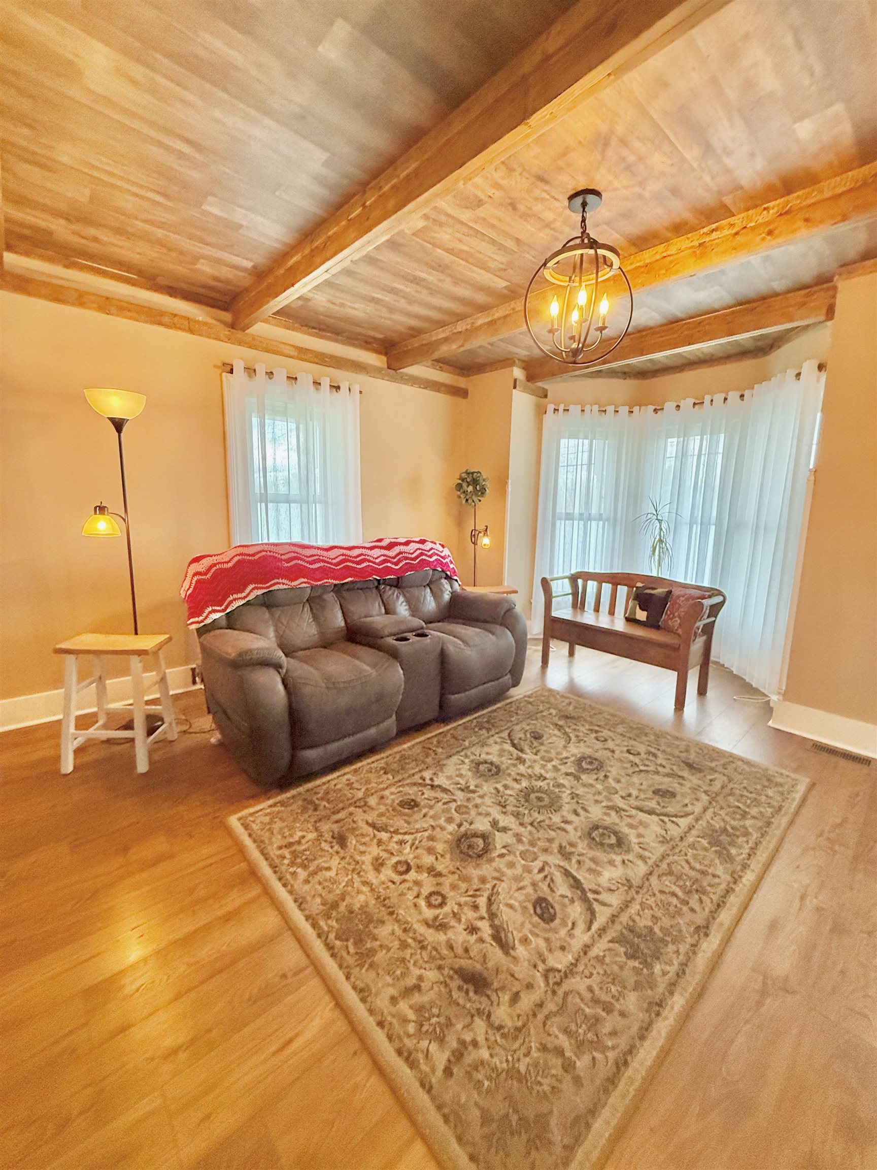 15385 Evergreen Valley Road Timberville, VA 22853 - Photo 13 of 44 a bed sitting in a bedroom next to a window