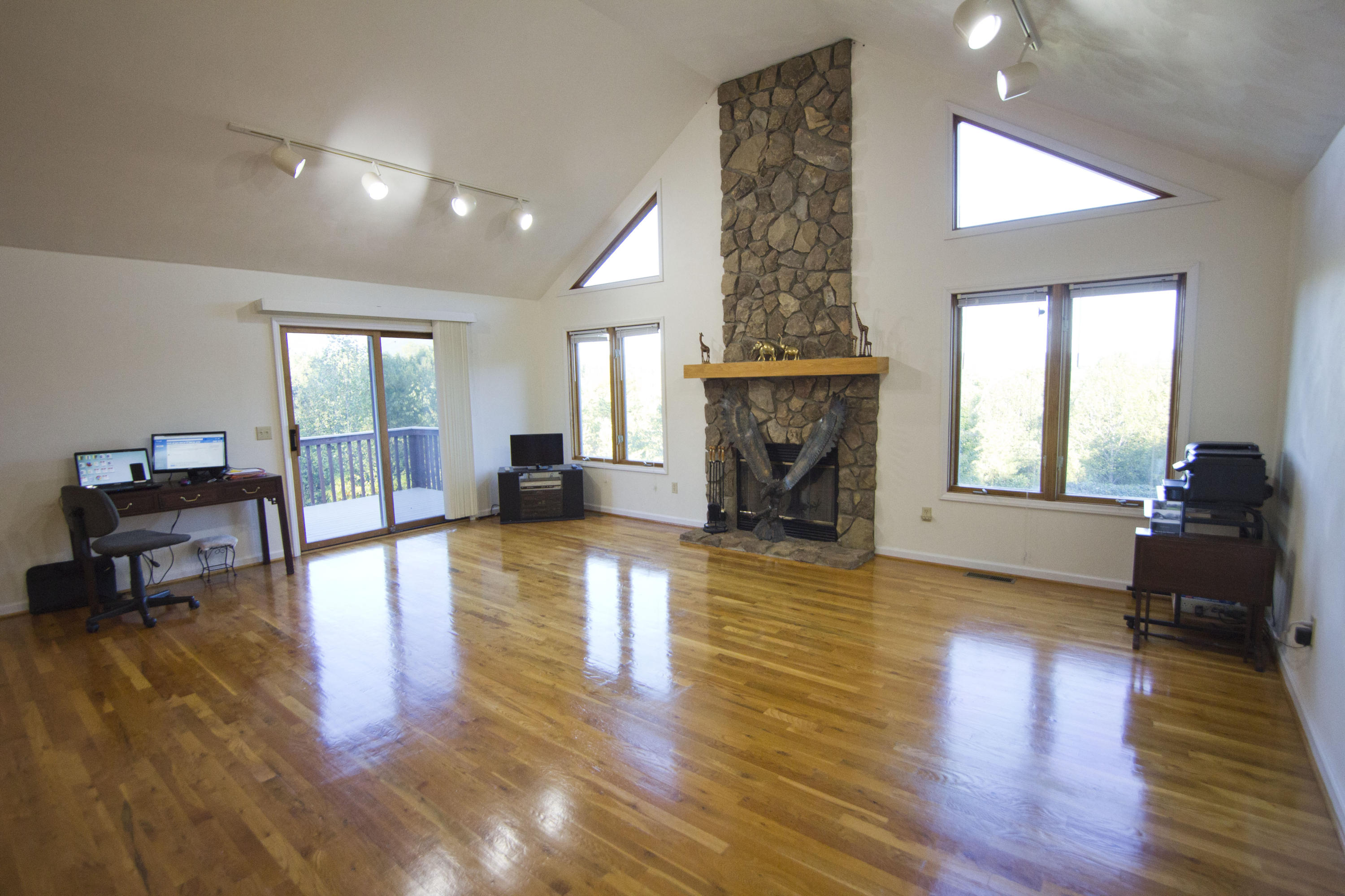 2365 Dugspur Road Callaway, VA 24067 - Photo 8 of 55 a living room with fireplace furniture and a wooden floor
