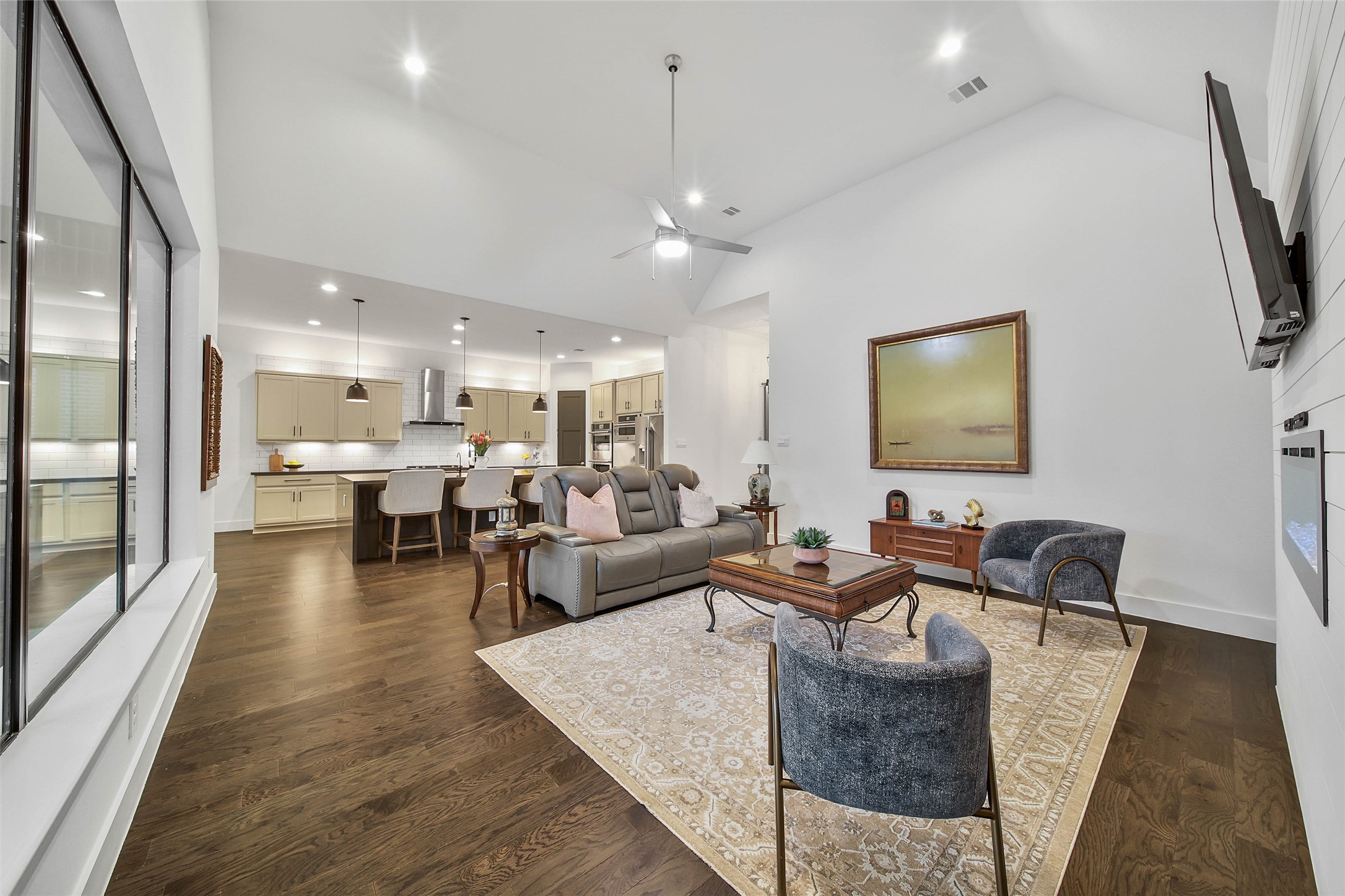 1015 Oak Briar Lane Conroe, TX 77384 - Photo 14 of 50 a living room with furniture and a flat screen tv