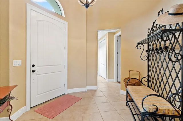 a kitchen with stainless steel appliances granite countertop a stove microwave and cabinets