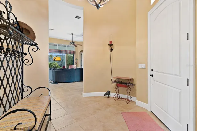 a patio with a yard table and chairs