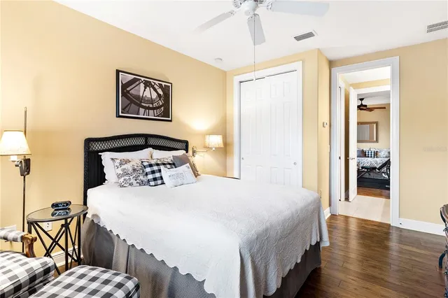 an aerial view of a house with a garden and swimming pool