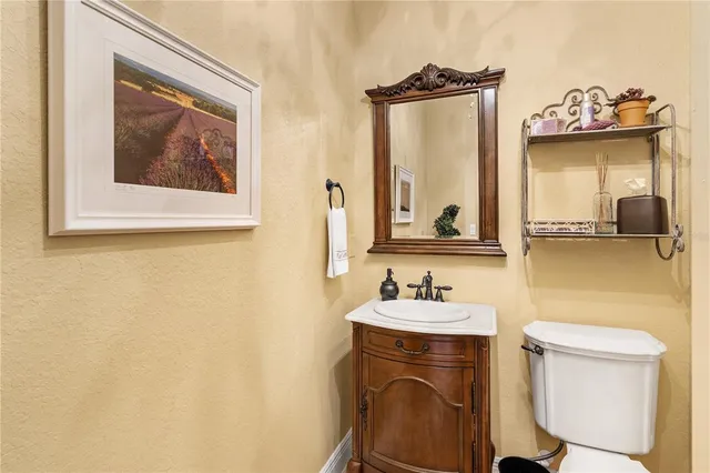 a swimming pool with outdoor seating and yard