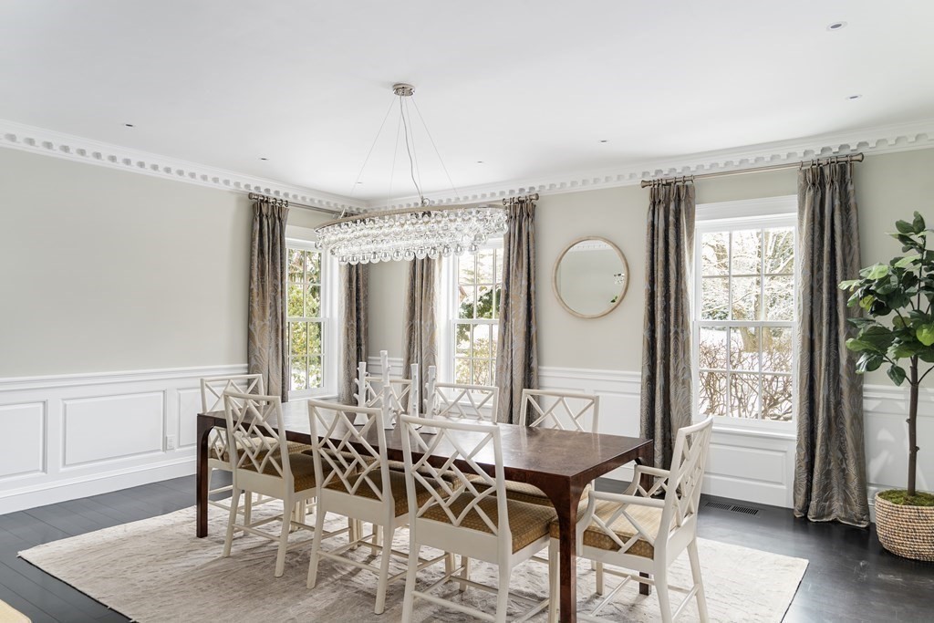 35 Wykeham Road Newton, MA 02465 - Photo 13 of 40 a view of a a dining room with furniture window and wooden floor