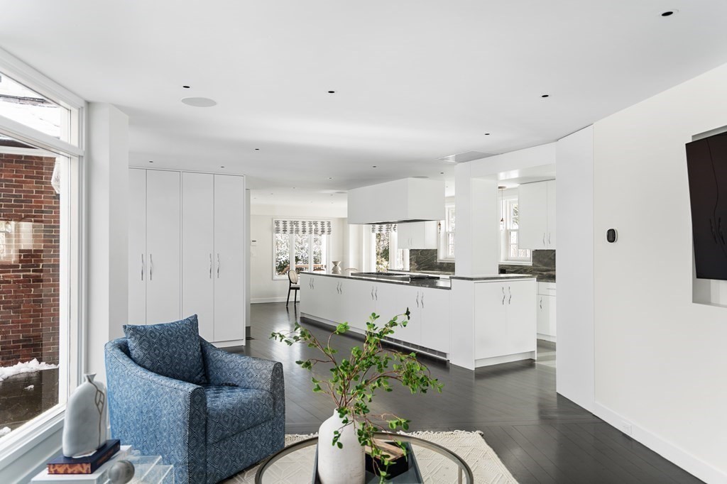 35 Wykeham Road Newton, MA 02465 - Photo 14 of 40 a living room with stainless steel appliances furniture and a kitchen view