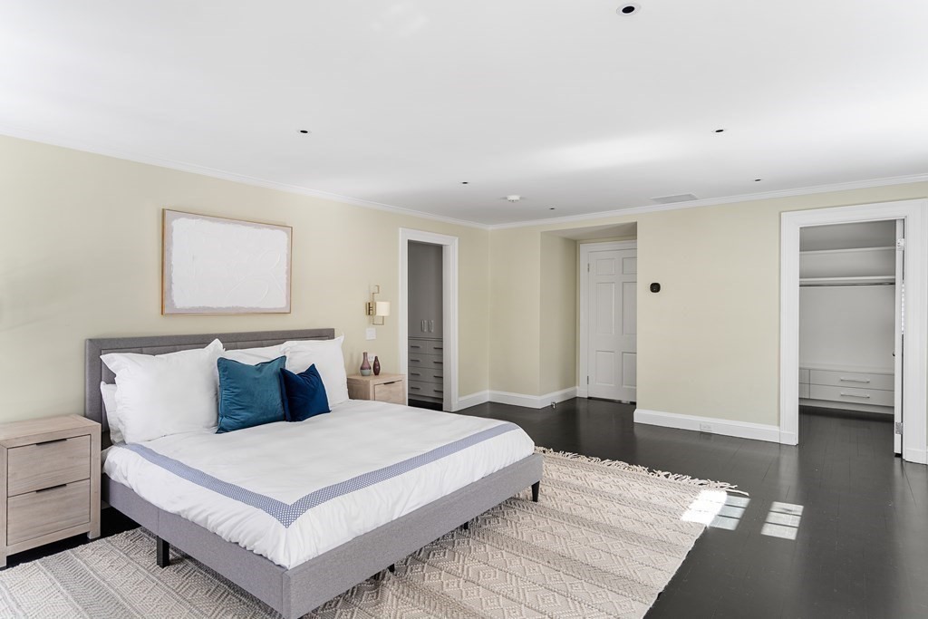 35 Wykeham Road Newton, MA 02465 - Photo 23 of 40 a bedroom with a bed and wooden floor