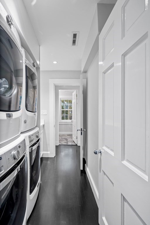 35 Wykeham Road Newton, MA 02465 - Photo 32 of 40 a view of a kitchen with a stove wooden cabinets and wooden floor