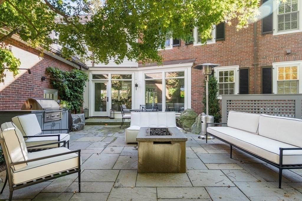 35 Wykeham Road Newton, MA 02465 - Photo 37 of 40 a view of a house and a back yard with a patio