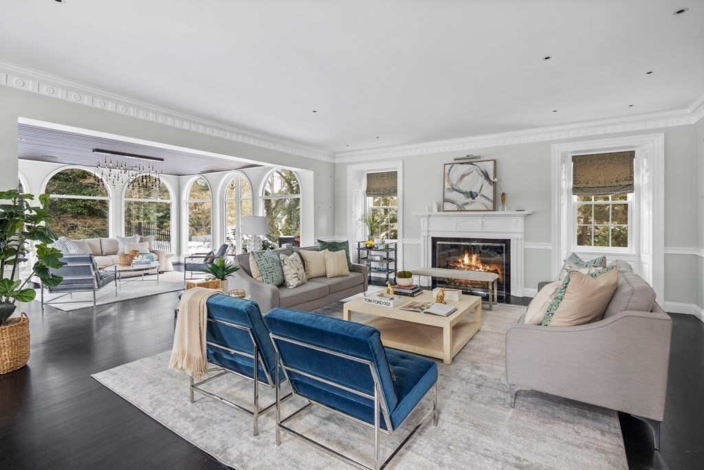 35 Wykeham Road Newton, MA 02465 - Photo 7 of 40 a living room with furniture fireplace and a large window