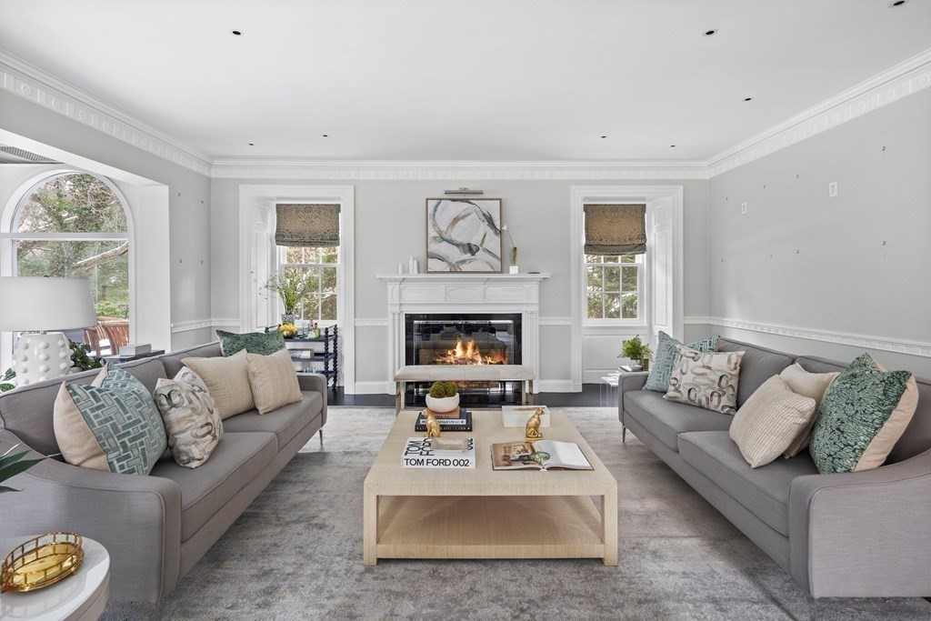 35 Wykeham Road Newton, MA 02465 - Photo 9 of 40 a living room with furniture and a fireplace