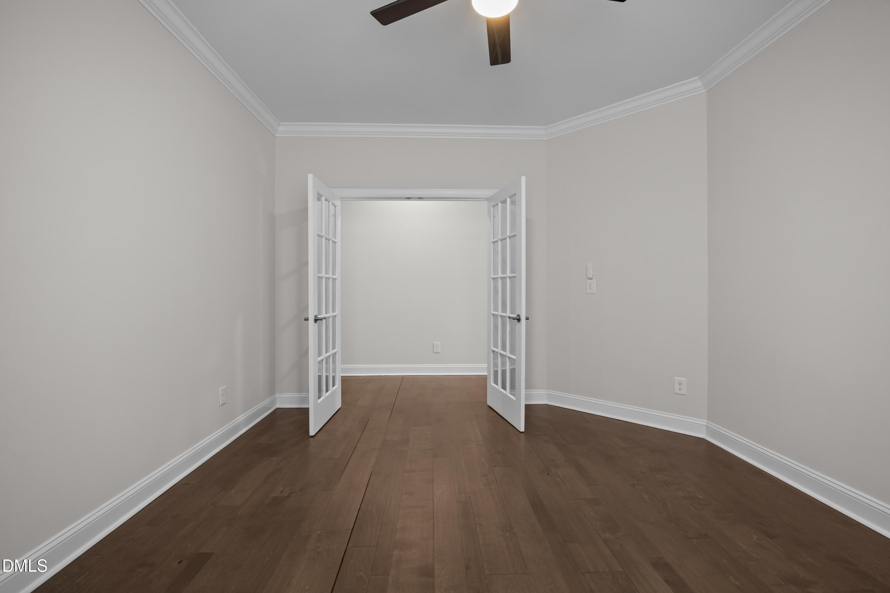 226 English Violet Lane Raleigh, NC 27610 - Photo 12 of 34 an empty room with wooden floor cabinet and closet