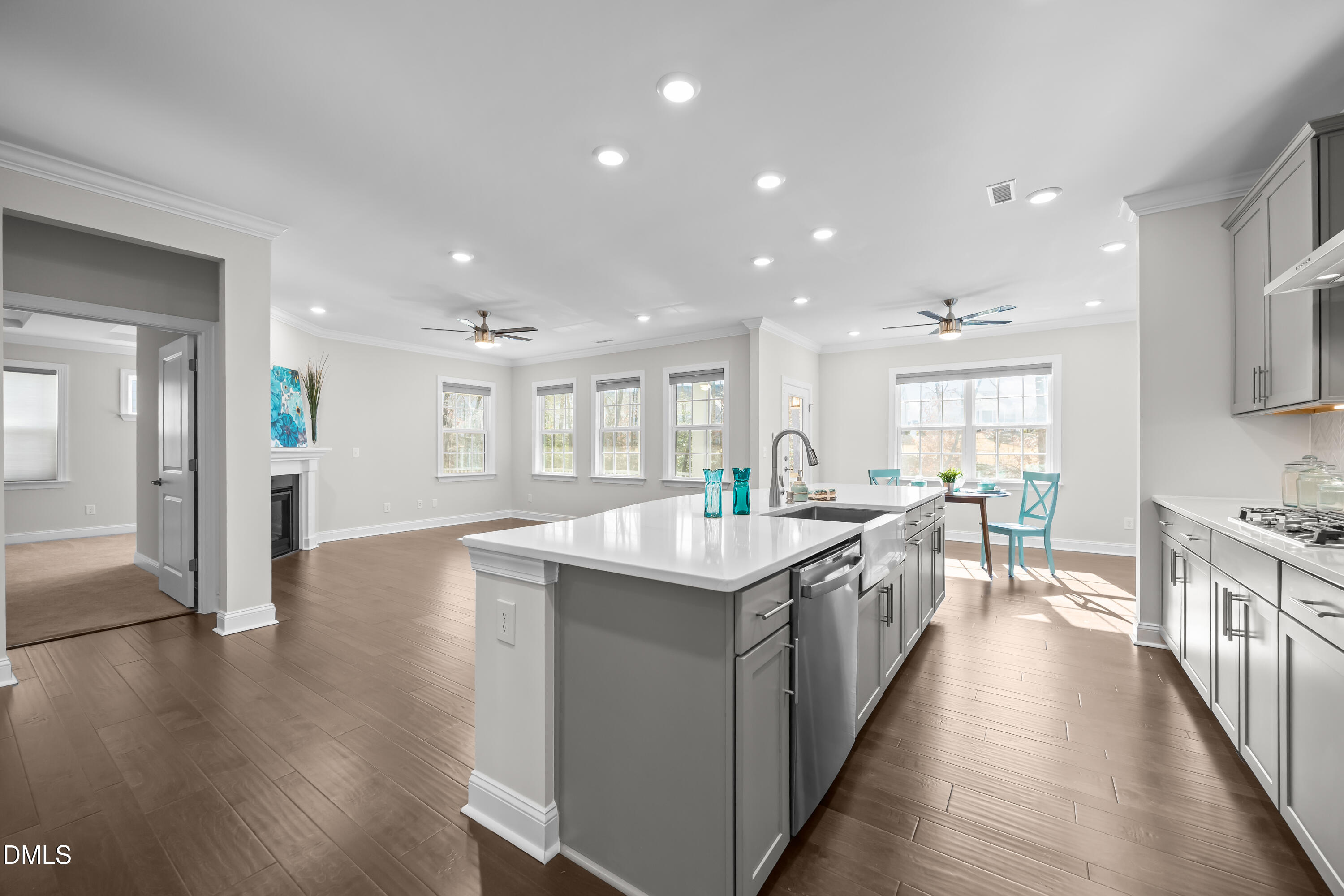 226 English Violet Lane Raleigh, NC 27610 - Photo 33 of 34 a large kitchen with stainless steel appliances lots of counter space and wooden floor