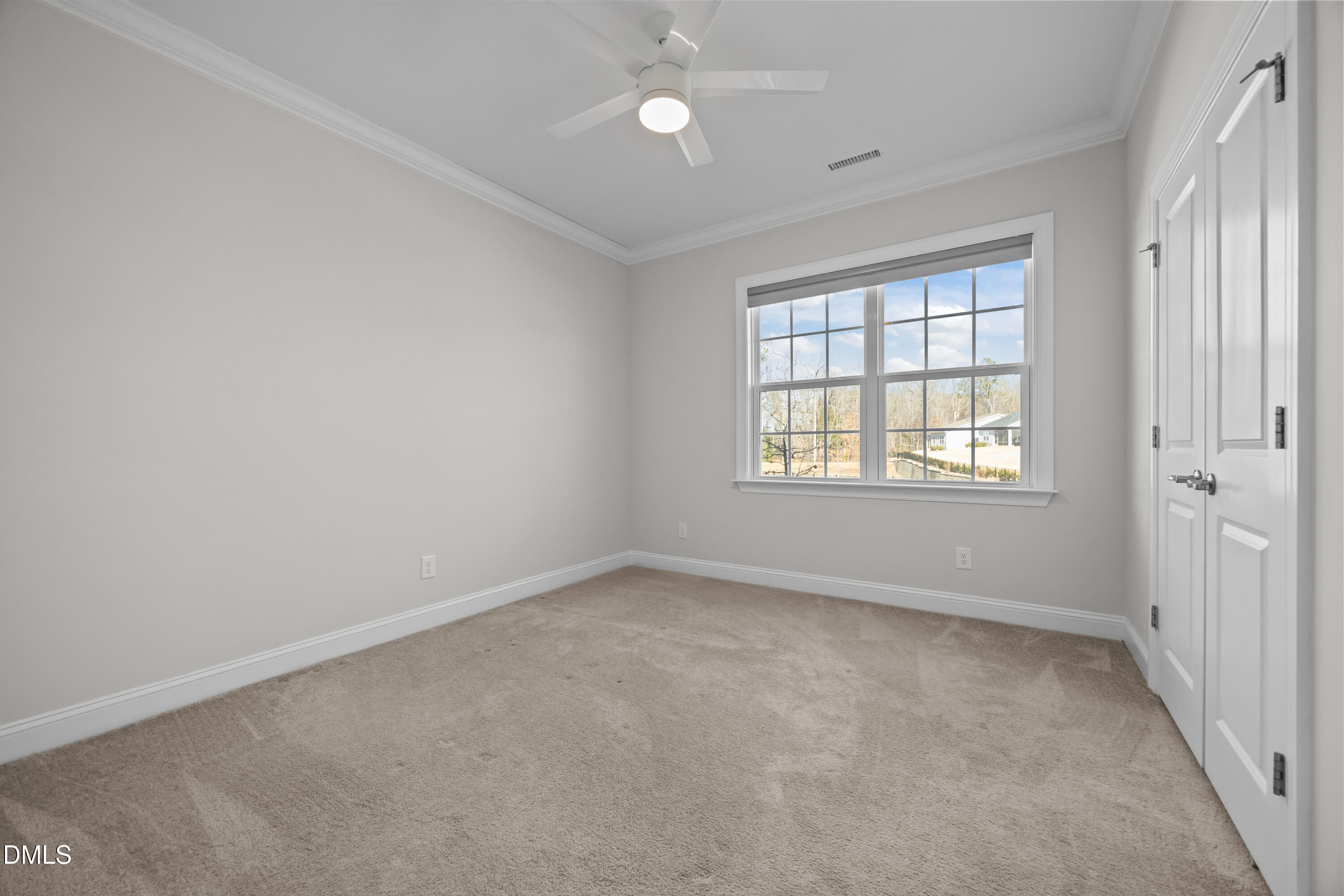 226 English Violet Lane Raleigh, NC 27610 - Photo 6 of 34 an empty room with a window