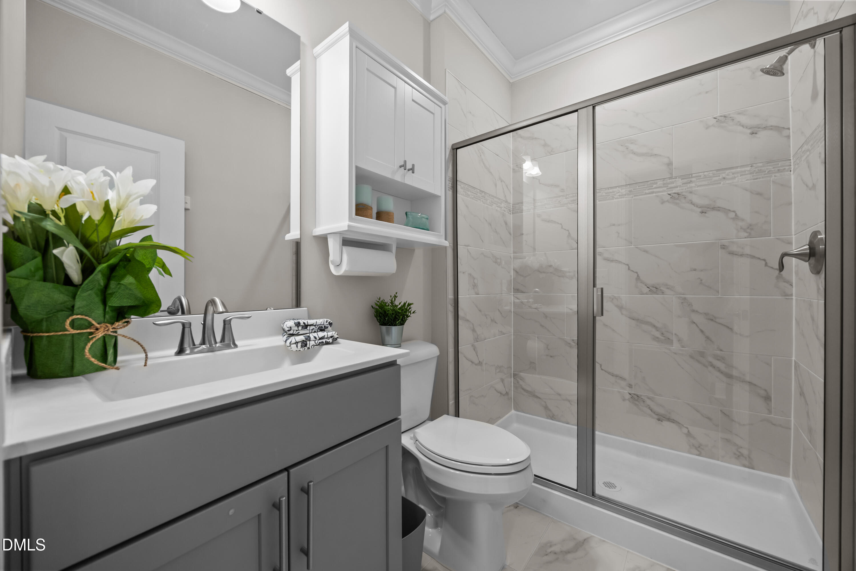 226 English Violet Lane Raleigh, NC 27610 - Photo 7 of 34 a bathroom with a sink a toilet and shower