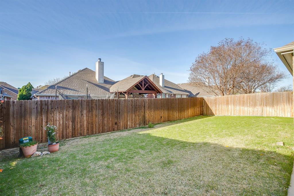 8105 Hosta Way Fort Worth, TX 76123 - Photo 30 of 33 a view of a back yard of the house